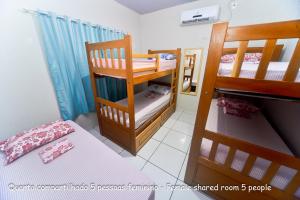 
Uma ou mais camas em beliche em um quarto em Hostel Lençóis Park
