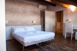 Voodi või voodid majutusasutuse Relais Casetta56 toas