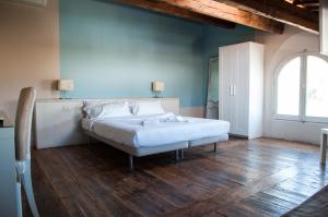 Posteľ alebo postele v izbe v ubytovaní Relais Casetta 56