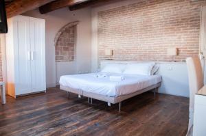 Voodi või voodid majutusasutuse Relais Casetta56 toas