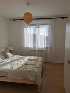 Postel nebo postele na pokoji v ubytování Hygge House