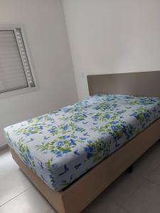Katil atau katil-katil dalam bilik di Lindo apartamento completo em Ubatuba