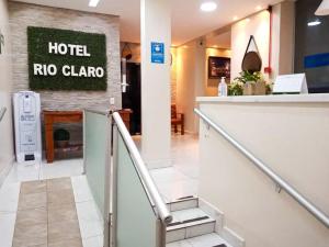 a hotel no camera sign on a wall in a lobby at Hotel Rio Claro in Rio Claro