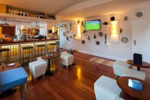 Televisi dan/atau pusat hiburan di Costa d'Oiro Ambiance Village