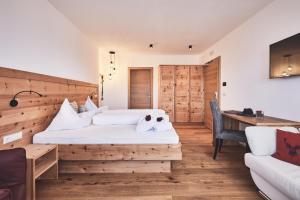 Postel nebo postele na pokoji v ubytování Hotel Kristall
