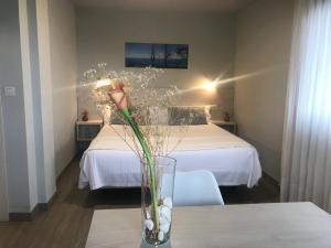 Postel nebo postele na pokoji v ubytování Hotel Kanala