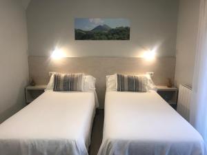 Postel nebo postele na pokoji v ubytování Hotel Kanala