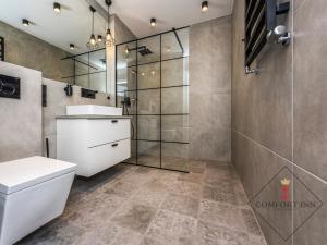 Kúpeľňa v ubytovaní COMFORT INN APARTMENTS - Gdansk, Sadowa + 37 fotografií