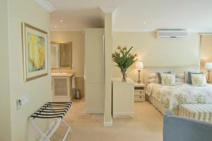 Ένα ή περισσότερα κρεβάτια σε δωμάτιο στο Last Word Constantia +54 φωτογραφίες