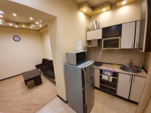 
Кухня или мини-кухня в Tatev Apartments
