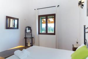 A bed or beds in a room at 155 Finca Son Rossignol by Mallorca Charme Még 27 kép