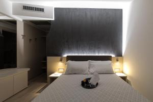A bed or beds in a room at Hotel Da Si-Si