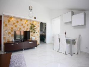 Кухня или мини-кухня в Deluxe Apartment Toni

