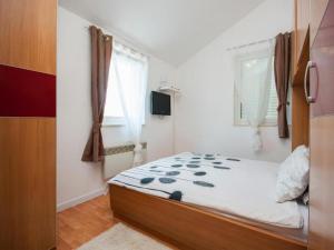 Кровать или кровати в номере Deluxe Apartment Toni