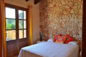Postel nebo postele na pokoji v ubytování 128 Finca Son Rossinyol ETV10657 by Mallorca Charme + 29 fotografií