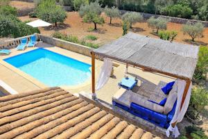 Výhled na bazén z ubytování Finca Son Rossinyol 128 by Mallorca Charme nebo okolí