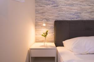 Ένα ή περισσότερα κρεβάτια σε δωμάτιο στο Luxury Apartments Loma +95 φωτογραφίες