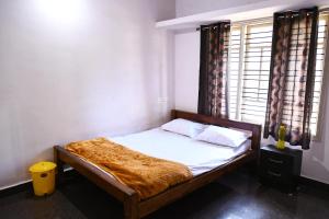 Кровать или кровати в номере Naturesky Homestay - Full Villa, Home Food & Coffee Estate