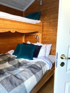 Postel nebo postele na pokoji v ubytování Joängets Fjällgård