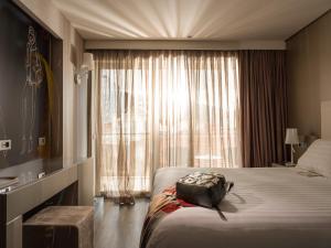 Posteľ alebo postele v izbe v ubytovaní Saz City Life Boutique Hotel