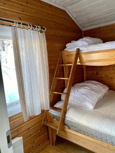 Postel nebo postele na pokoji v ubytování Joängets Fjällgård