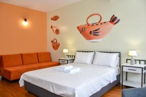 Postel nebo postele na pokoji v ubytování Osten Art Hotel