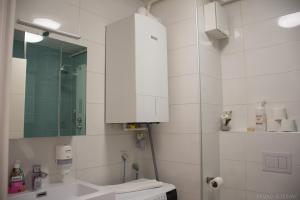 Kúpeľňa v ubytovaní West Residence Luxury Apartment- parking in garage + 22 fotografií