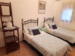 Krevet ili kreveti u jedinici u okviru objekta Apartamentos Rurales Fuente de Marzo