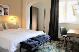 Postel nebo postele na pokoji v ubytování Piesteritzer Hof - Hotel Garni