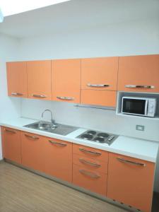 Кухня или мини-кухня в Residence Delta
