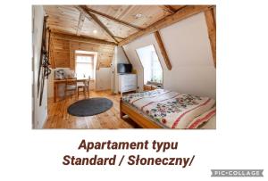 Posteľ alebo postele v izbe v ubytovaní Apartamenty Pod Skocznią