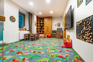 Telewizja i/lub zestaw kina domowego w obiekcie Grandhotel Tatra