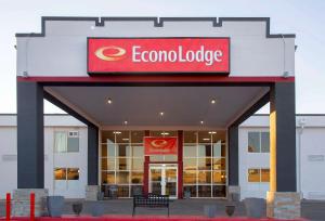 a building with a sign on the front of a store at Econo Lodge in Ardmore