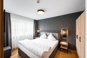 Postel nebo postele na pokoji v ubytování A Casa Elements