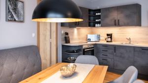 Kuchyň nebo kuchyňský kout v ubytování A Casa Elements