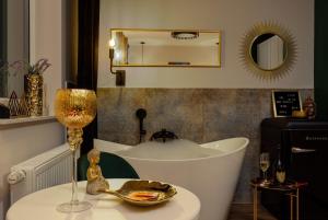 Kúpeľňa v ubytovaní Apartment Jana Kazimierza Wola by Noclegi Renters