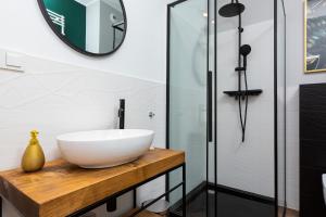 Kúpeľňa v ubytovaní Apartment Jana Kazimierza Wola by Noclegi Renters