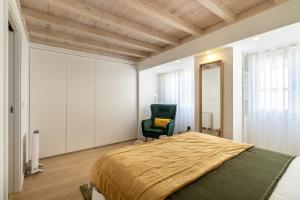 Postel nebo postele na pokoji v ubytování CAROL BEACH HOUSE