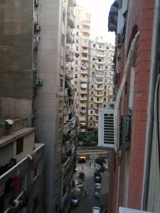 a view of a city street with tall buildings at Saraya Eltram-families only in Alexandria