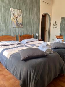 Postel nebo postele na pokoji v ubytování ALBERGO 900Strati