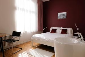 Postel nebo postele na pokoji v ubytování Villa Les Paquerettes