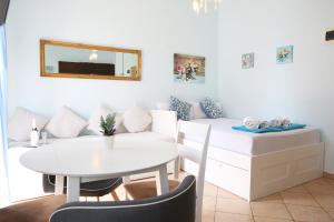Posezení v ubytování Villa mit Whirlpool für 32 Per