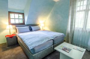 Postel nebo postele na pokoji v ubytování Hotel-Restaurant Ochsen