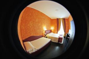 Posteľ alebo postele v izbe v ubytovaní Pisolo Resort