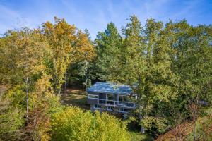 an aerial view of a house in the woods at Le Chalet in Vresse-sur-Semois