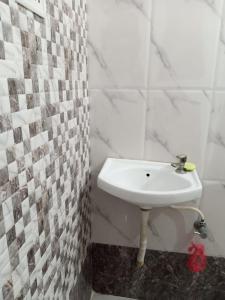 Vonios kambarys apgyvendinimo įstaigoje Nand Villa 2Bhk