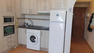 A kitchen or kitchenette at Carihuela Park Palace Studio
