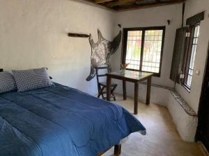 Postel nebo postele na pokoji v ubytování Chez Gigi - Eco Lodge