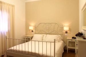 Krevet ili kreveti u jedinici u objektu CASA EN FORMENTERA con 4 habitaciones, terraza, parking privado