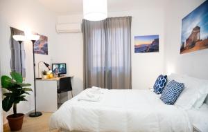 Posteľ alebo postele v izbe v ubytovaní Il Moro - Agrigento Rooms